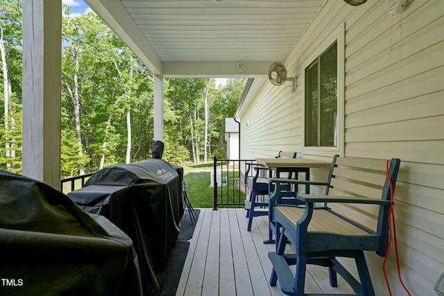 wooden terrace with grilling area