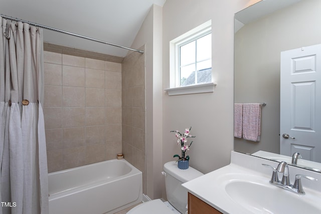 full bathroom featuring toilet, vanity, and shower / tub combo