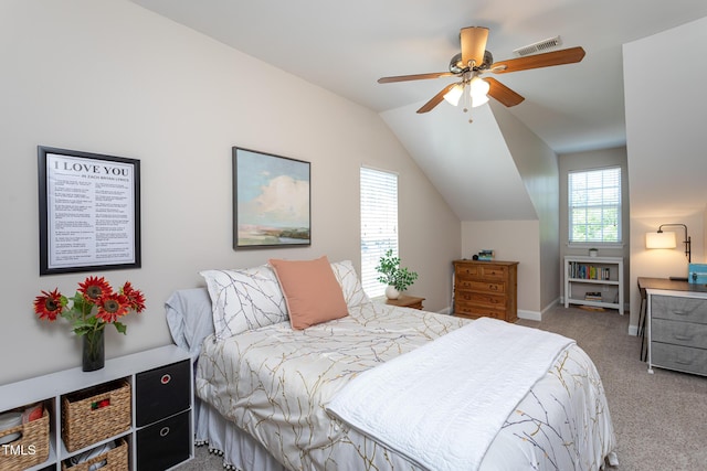 bedroom featuring carpet flooring, lofted ceiling, baseboards, and a ceiling fan