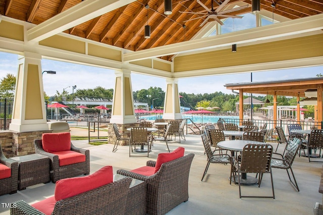 view of patio with a ceiling fan, outdoor lounge area, a gazebo, and outdoor dining area