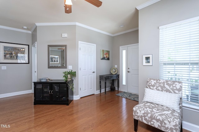 3827 Heritage Spring Cir, Wake Forest, NC 27587 - sitting room with wood finished floors, ceiling fan, ornamental molding, and baseboards