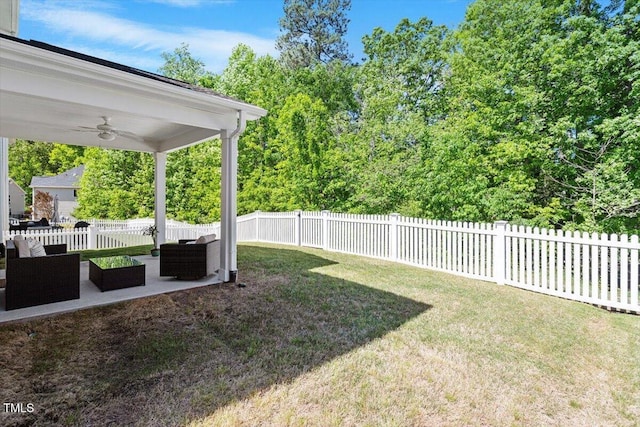 view of yard with a fenced backyard, a ceiling fan, a patio area, and outdoor lounge area