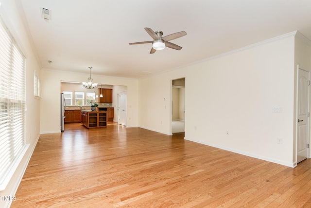 1522 Palmer Hill Dr, Durham, NC 27703 - unfurnished living room featuring baseboards, ornamental molding, ceiling fan with notable chandelier, and light wood finished floors