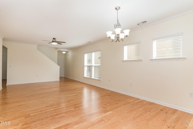 1522 Palmer Hill Dr, Durham, NC 27703 - empty room with baseboards, ornamental molding, light wood-style flooring, and ceiling fan with notable chandelier