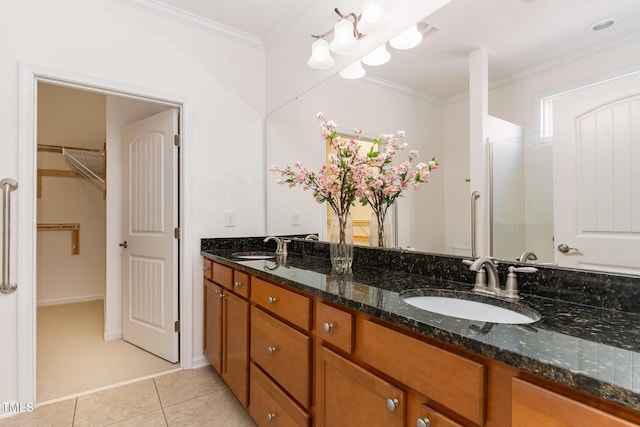 1522 Palmer Hill Dr, Durham, NC 27703 - bathroom with double vanity, a sink, tile patterned floors, and ornamental molding