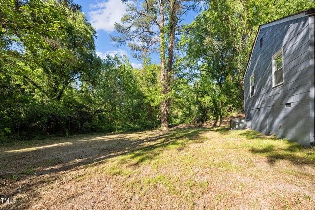 1613 Kilmer Ter, Durham, NC 27703 - view of yard featuring central air condition unit