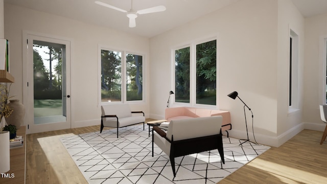 1800 Pershing Rd, Raleigh, NC 27608 - living area featuring light wood finished floors, ceiling fan, and baseboards