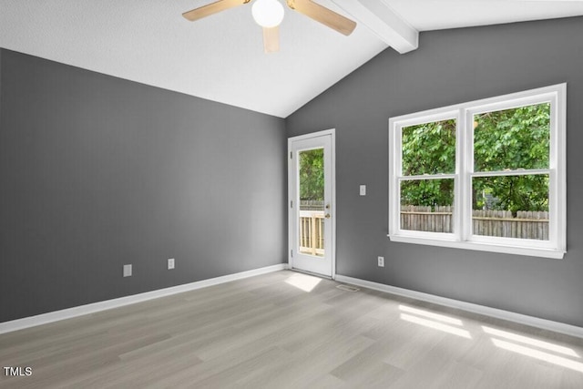 2402 Cynthia Dr, Durham, NC 27704 - spare room featuring wood finished floors, a ceiling fan, baseboards, and lofted ceiling with beams