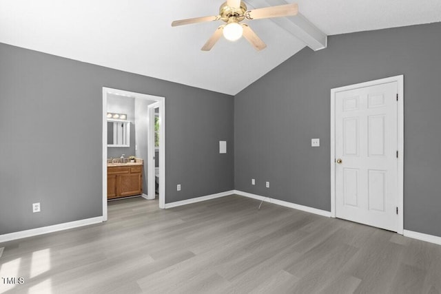 2402 Cynthia Dr, Durham, NC 27704 - unfurnished bedroom with lofted ceiling with beams, ensuite bathroom, baseboards, wood finished floors, and ceiling fan