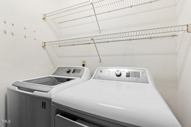 2402 Cynthia Dr, Durham, NC 27704 - clothes washing area featuring washer and dryer and laundry area