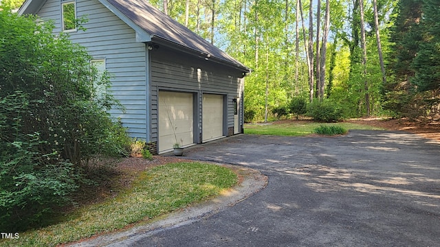 113 Colonial Dr, Wendell, NC 27591 - garage featuring driveway