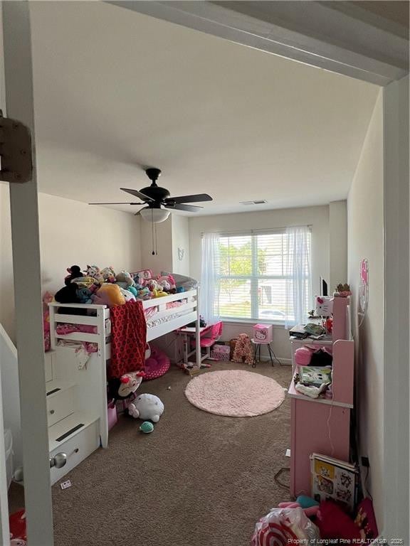 carpeted bedroom featuring a ceiling fan