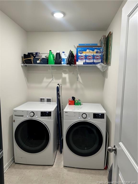 clothes washing area with laundry area and independent washer and dryer
