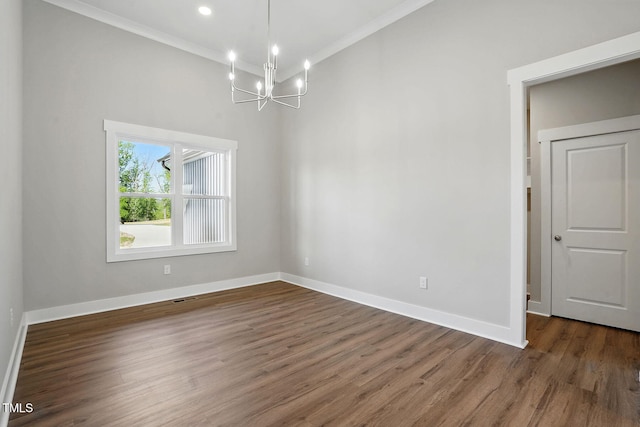 8629 Dukes Lake Rd, Zebulon, NC 27597 - spare room featuring a chandelier, crown molding, and wood finished floors