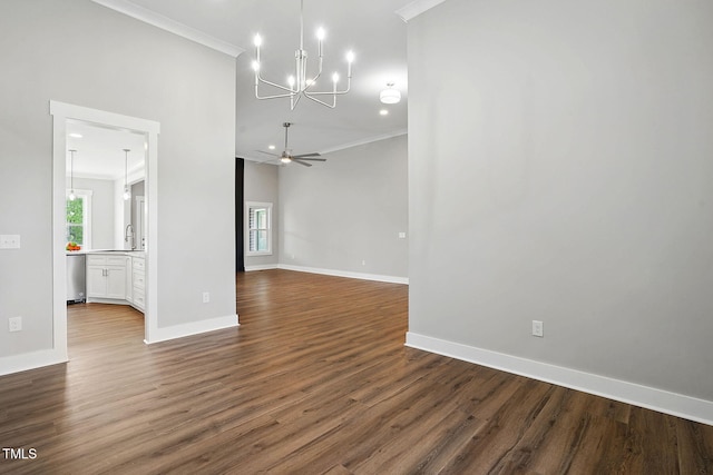 8629 Dukes Lake Rd, Zebulon, NC 27597 - unfurnished room featuring a chandelier, crown molding, dark wood finished floors, and a ceiling fan