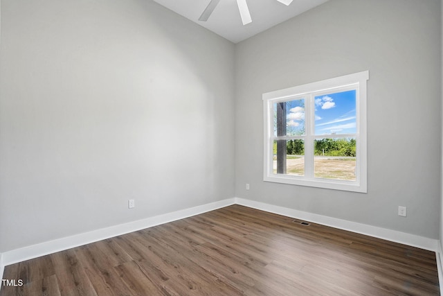 8629 Dukes Lake Rd, Zebulon, NC 27597 - spare room with ceiling fan, wood finished floors, and vaulted ceiling