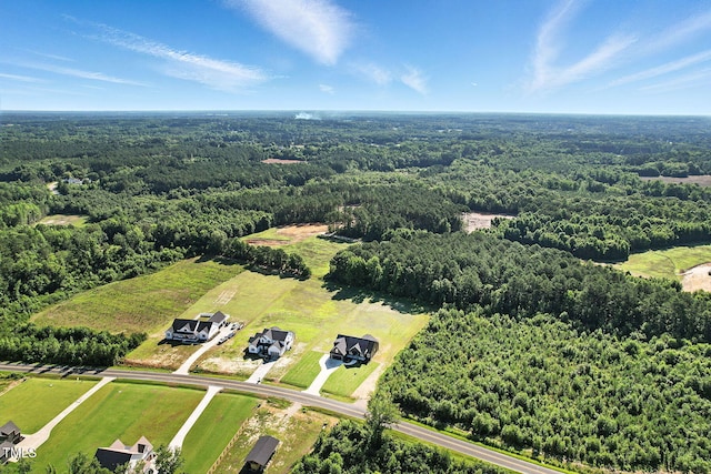 8629 Dukes Lake Rd, Zebulon, NC 27597 - drone / aerial view of a heavily wooded area