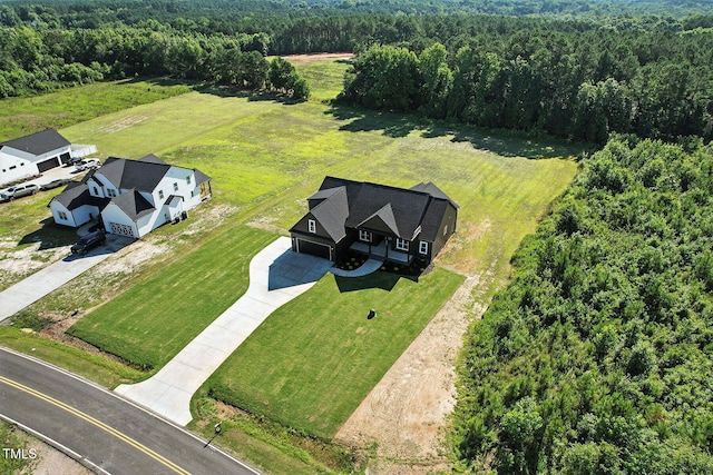 8629 Dukes Lake Rd, Zebulon, NC 27597 - view from above of property with a heavily wooded area