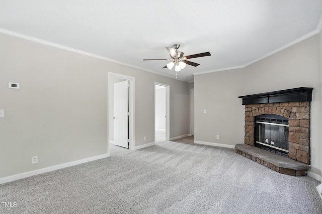 unfurnished living room featuring crown molding, baseboards, carpet, and a ceiling fan