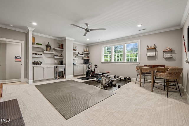 workout room featuring ceiling fan, ornamental molding, and recessed lighting