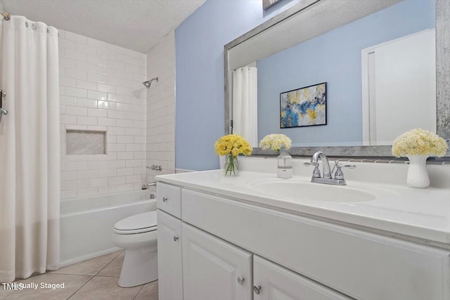 5124 Lazywood Ln, Durham, NC 27712 - full bath featuring vanity, shower / tub combo with curtain, tile patterned flooring, and a textured ceiling