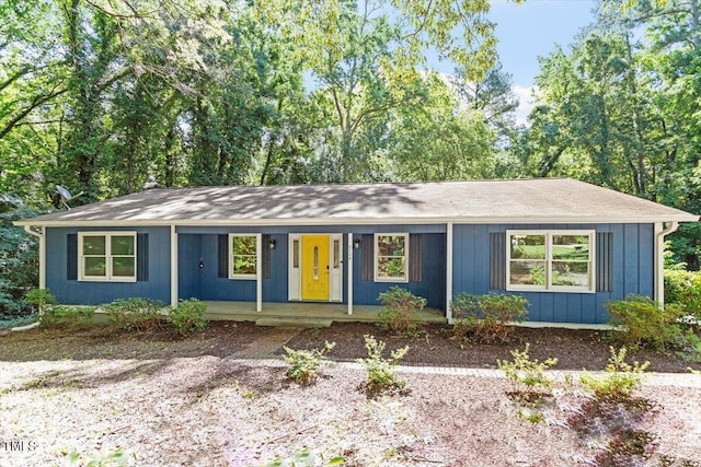 5124 Lazywood Ln, Durham, NC 27712 - ranch-style house with covered porch and roof with shingles