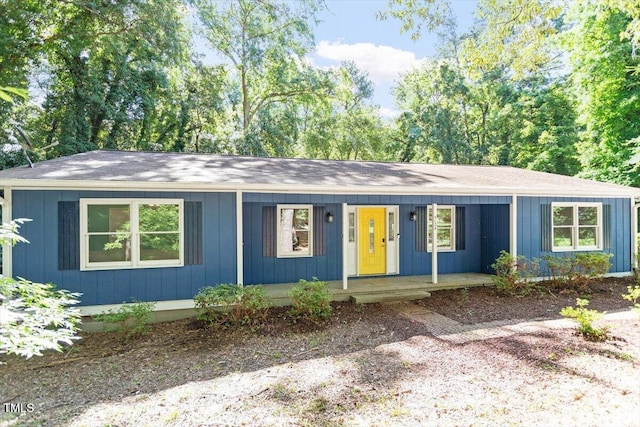 5124 Lazywood Ln, Durham, NC 27712 - single story home with a porch and a shingled roof
