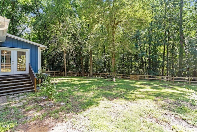 5124 Lazywood Ln, Durham, NC 27712 - fenced backyard featuring french doors