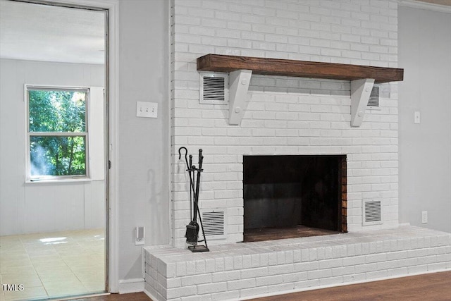 5124 Lazywood Ln, Durham, NC 27712 - detailed view of a fireplace and wood finished floors