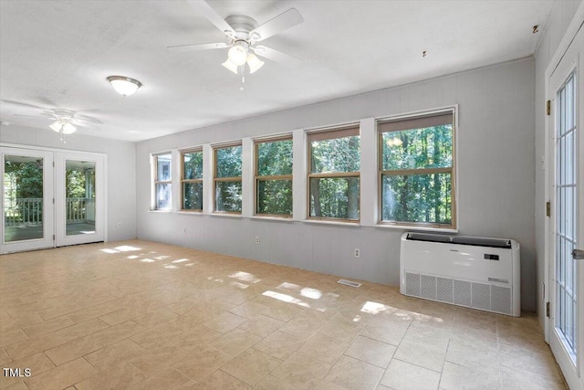 5124 Lazywood Ln, Durham, NC 27712 - empty room with a ceiling fan, heating unit, and wood walls