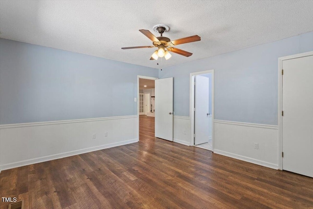 5124 Lazywood Ln, Durham, NC 27712 - unfurnished bedroom with wood finished floors, a textured ceiling, and ceiling fan