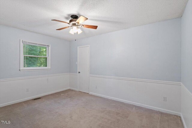 5124 Lazywood Ln, Durham, NC 27712 - carpeted spare room with ceiling fan and a textured ceiling