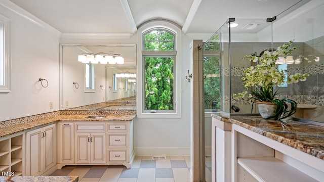 full bathroom featuring tile patterned floors, a shower stall, baseboards, vanity, and lofted ceiling