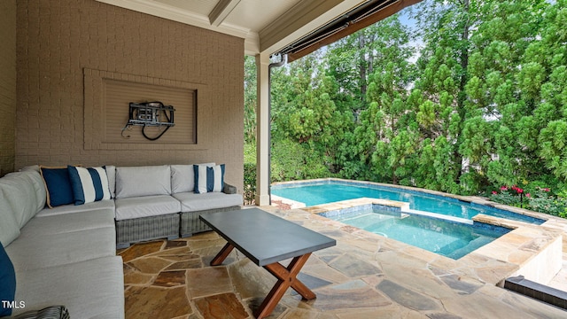view of pool featuring outdoor lounge area, a patio area, and a pool with connected hot tub