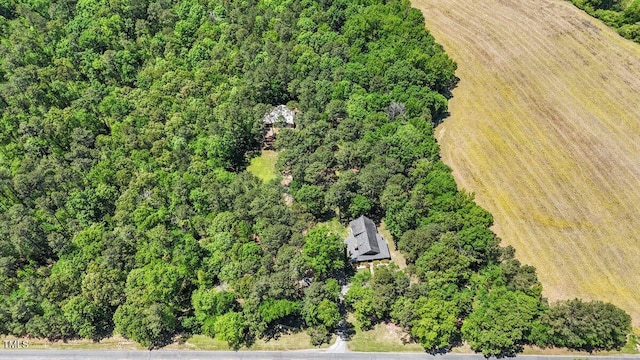 aerial view featuring a view of trees