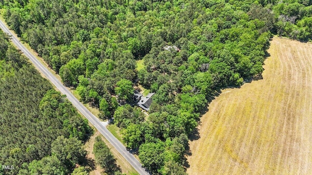 aerial view featuring a forest view