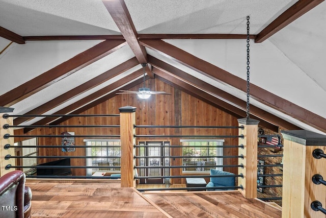 unfinished attic featuring a healthy amount of sunlight