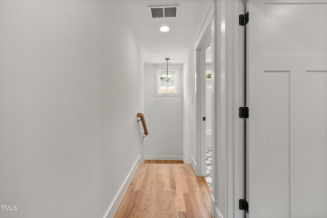 1005 Forrestal Pl, Durham, NC 27707 - hallway with baseboards and light wood-type flooring