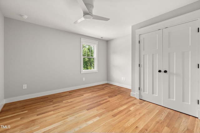 1005 Forrestal Pl, Durham, NC 27707 - unfurnished bedroom featuring light wood-style floors, a ceiling fan, and a closet