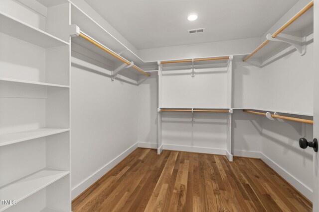 1005 Forrestal Pl, Durham, NC 27707 - spacious closet featuring wood finished floors