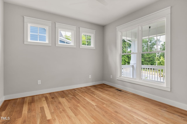 1005 Forrestal Pl, Durham, NC 27707 - spare room featuring light wood finished floors and a ceiling fan