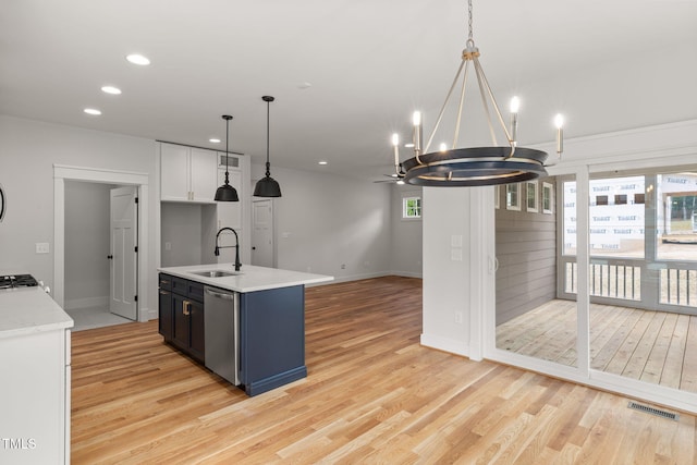 1005 Forrestal Pl, Durham, NC 27707 - kitchen featuring open floor plan, dishwasher, light wood finished floors, light countertops, and recessed lighting