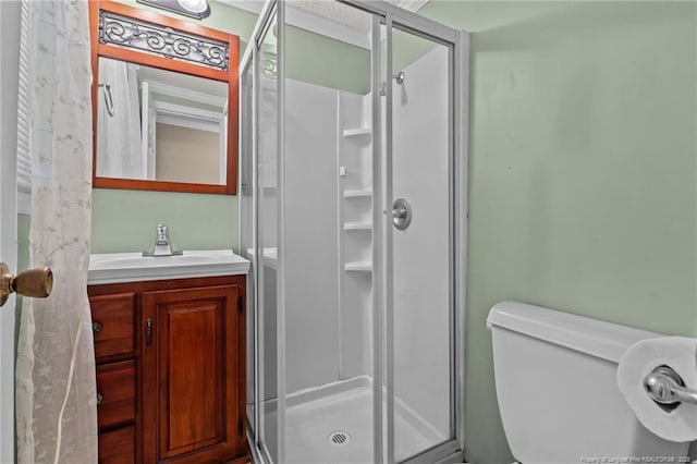 3042 Overhills Rd, Bunnlevel, NC 28323 - bathroom featuring a shower stall, vanity, and toilet
