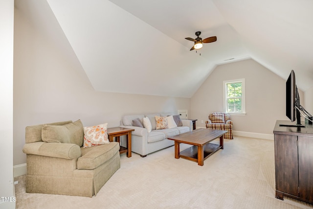living room with lofted ceiling, light carpet, ceiling fan, and baseboards