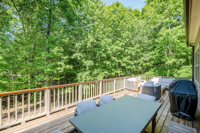 deck featuring an outdoor hangout area and outdoor dining area
