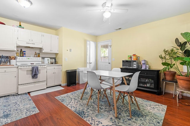 7313 Longstreet Dr, Raleigh, NC 27615 - dining room with ceiling fan, dark wood-type flooring, and visible vents