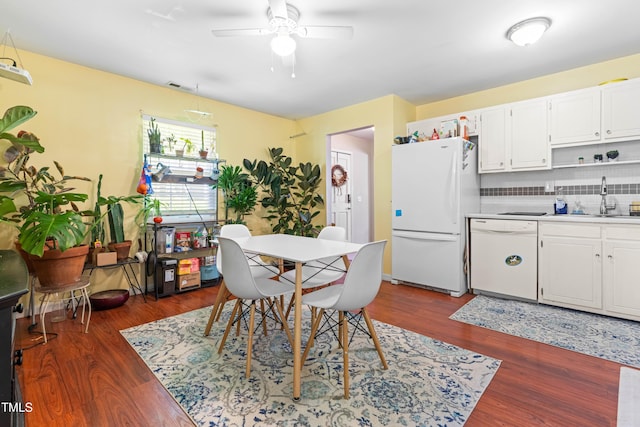 7313 Longstreet Dr, Raleigh, NC 27615 - dining space with visible vents, dark wood-style floors, and ceiling fan