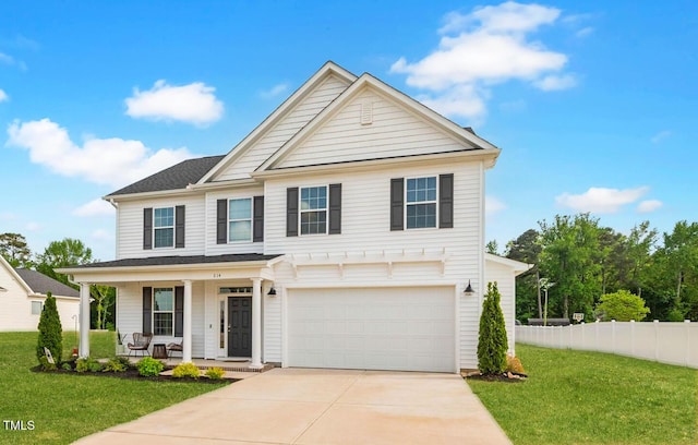 214 Thumper Way, Clayton, NC 27520 - view of front of house with covered porch, driveway, and an attached garage