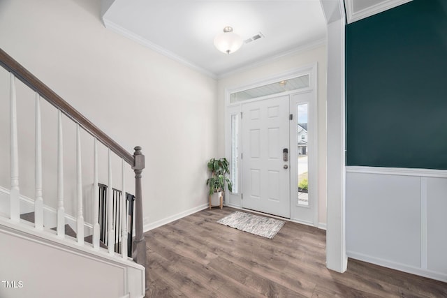 214 Thumper Way, Clayton, NC 27520 - foyer with crown molding, wood finished floors, and stairway