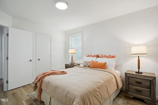 bedroom featuring light wood-type flooring